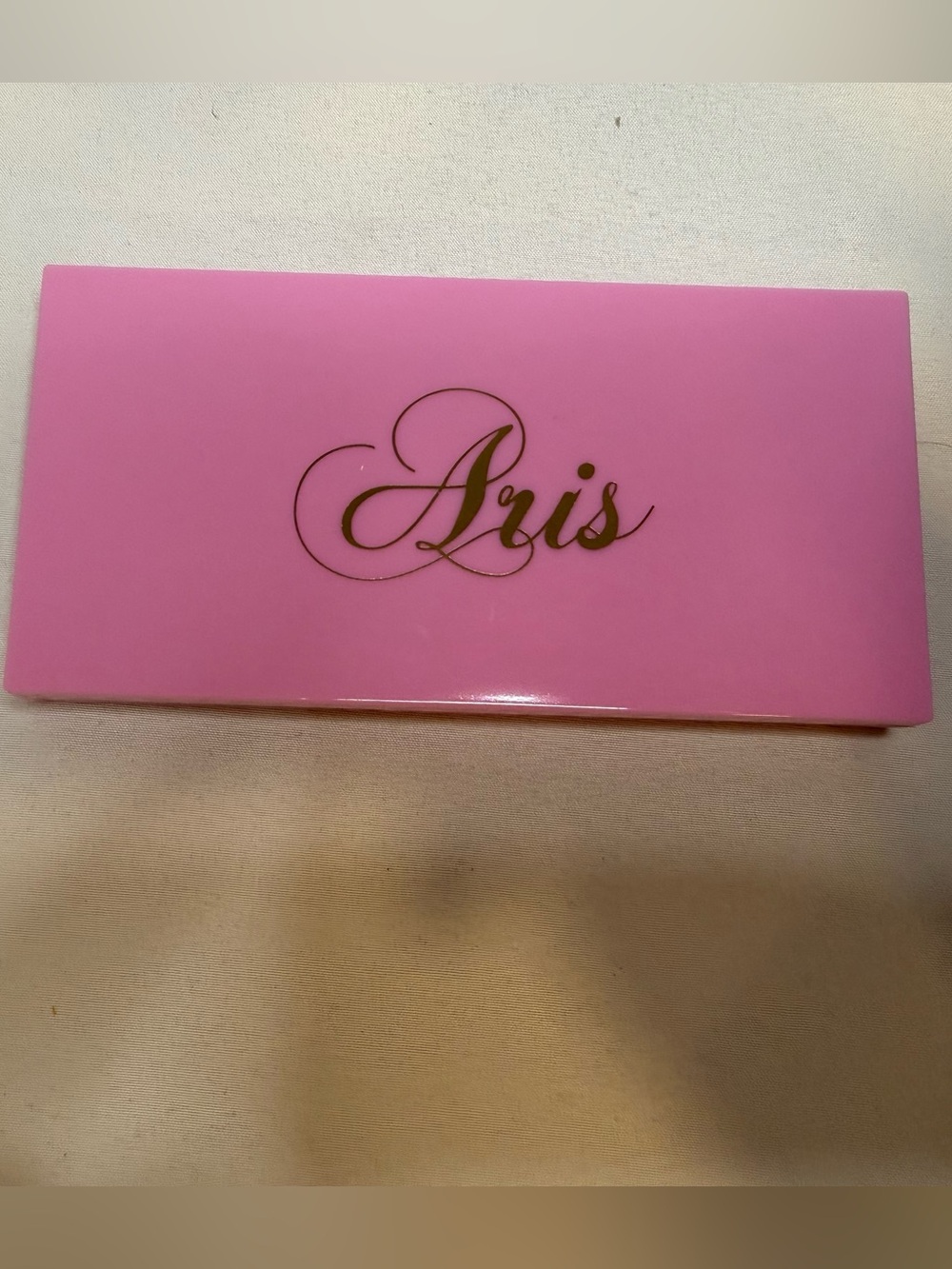 Aris Glossy Pink Palette with Gold Script Logo